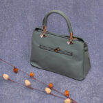 green hand bag